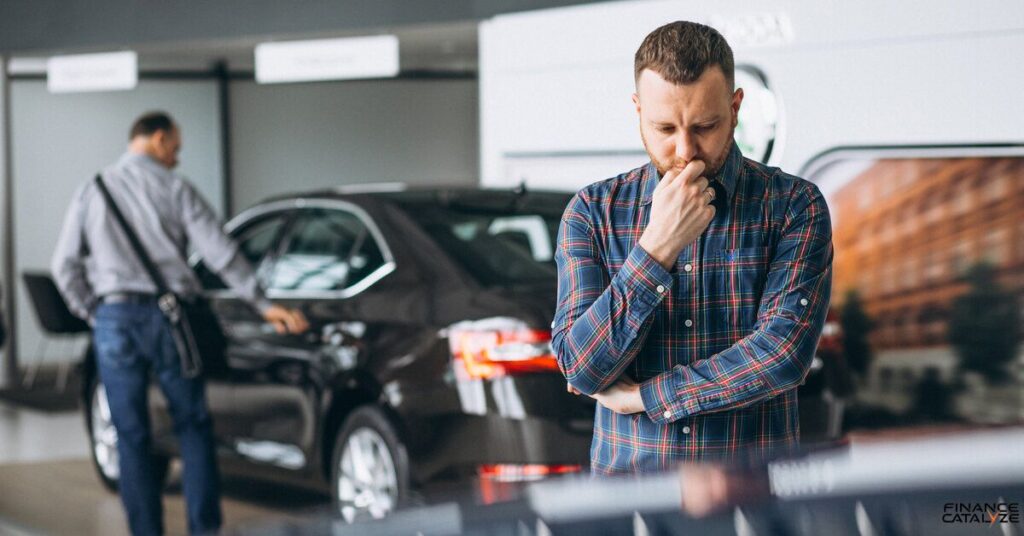 Can I trade in a financed car for a cheaper car?